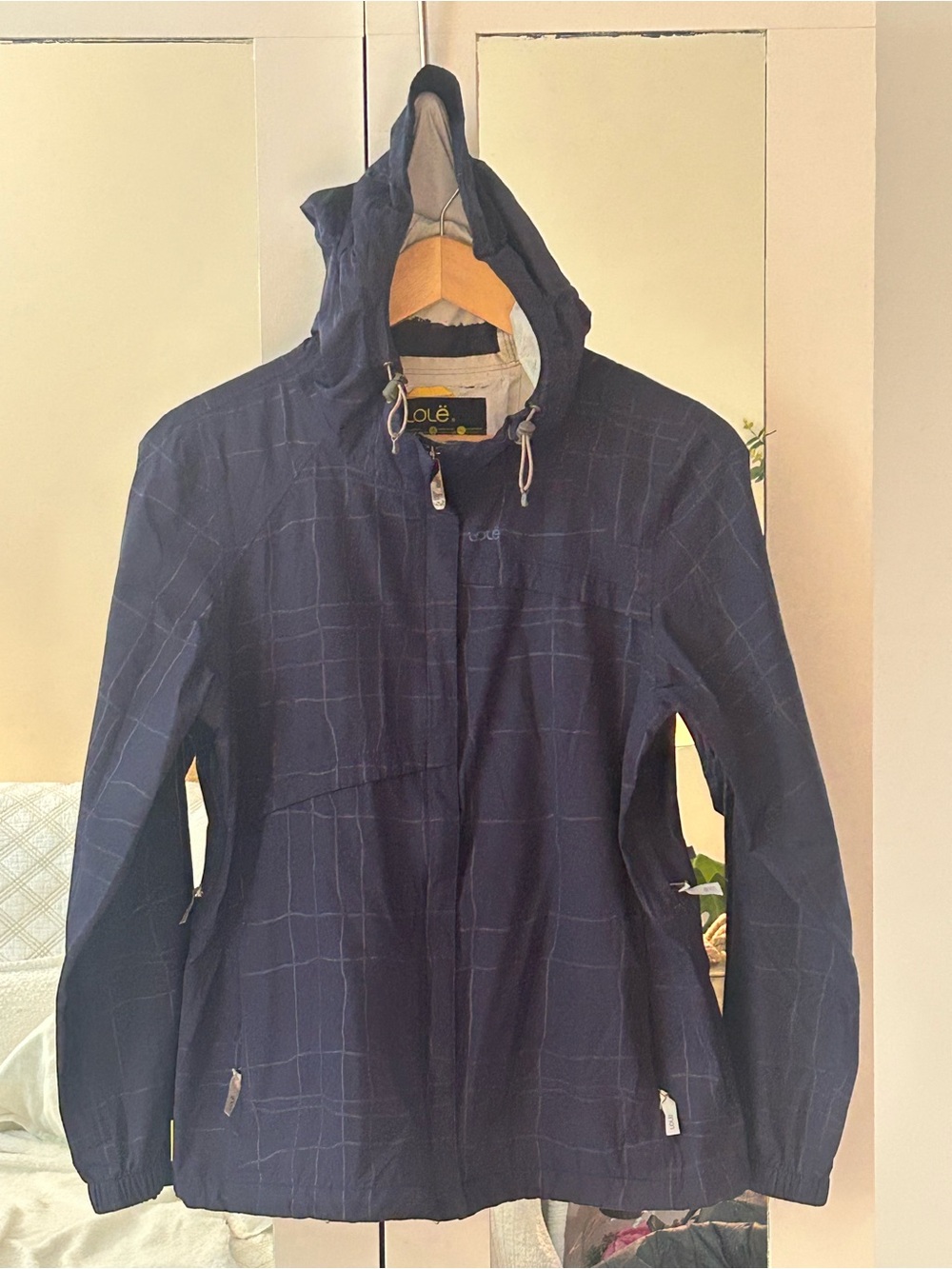 Lolë Navy Blue Grid Pattern Waterproof
Rain Jacket- size M (8-10)